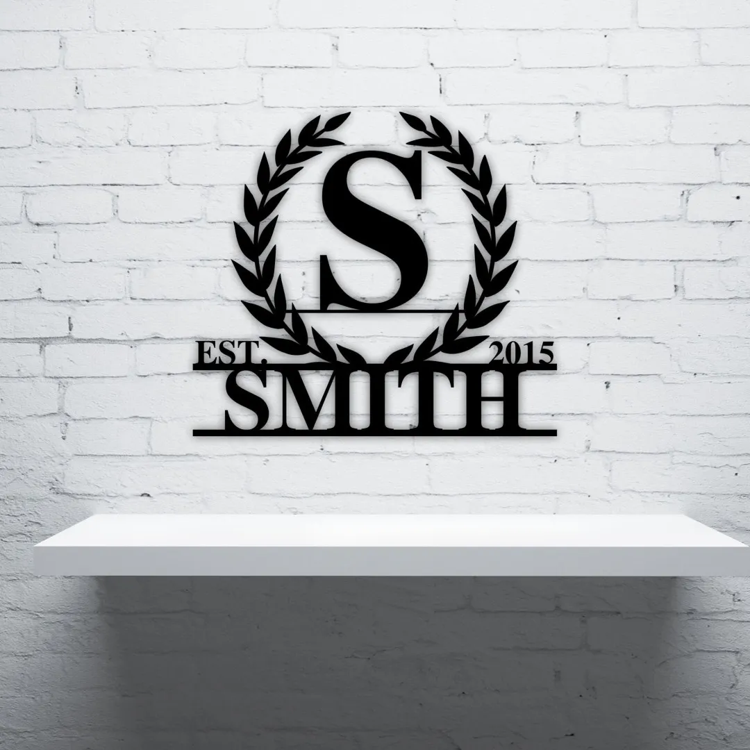 il_fullxfull.3189205194_i446_1024x1024_2x_4c4fbcc9-1e33-4dd9-a7d4-879dac6a6441.webp Leafy Border Last Name Monogram, Custom Family Name Sign, Housewarming Gift, Metal Monogram, Framed Family Initial, Letter Door Sign Hanger